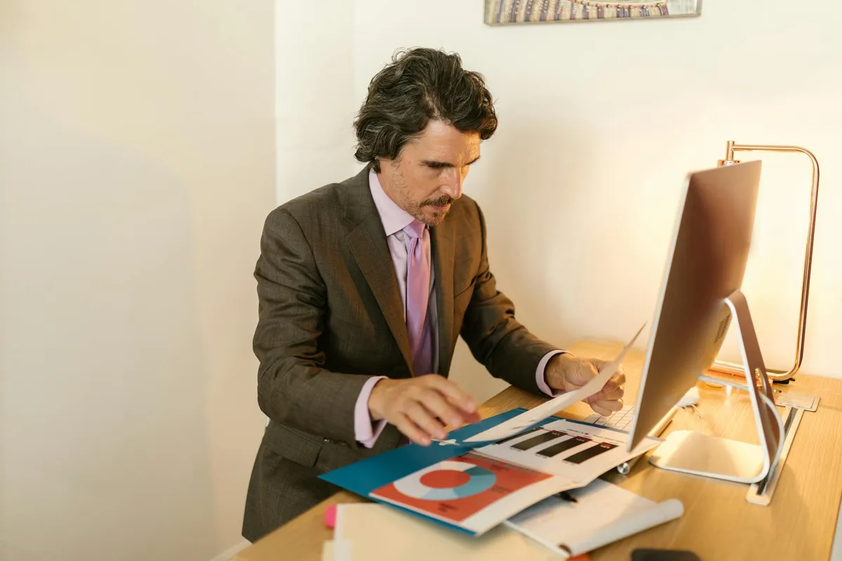 A compliance-audit document on a professional office desk